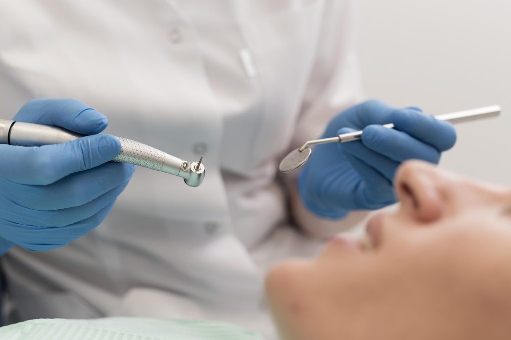 female-patient-having-procedure-done-dentist